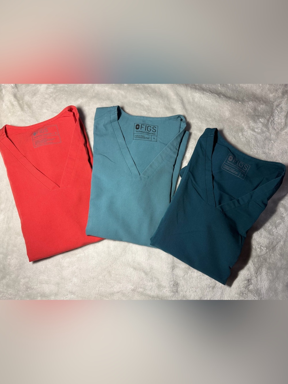 Figs V-Neck Scrub Tops in Coral Red, Light Teal, and Deep Teal
